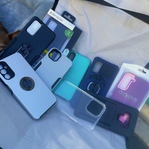 MORE Phone cases!! Each case comes with screen protectors (while supplies last)